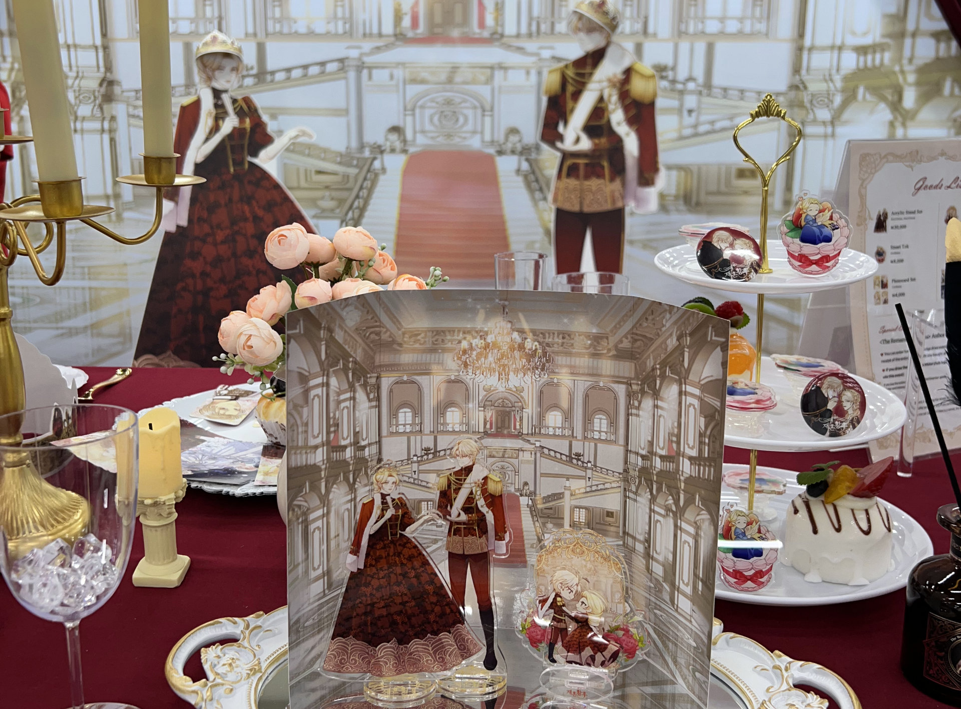Farther in and on the same floor, the booth for The Remarried Empress (written by AlphaTart, adapted by HereLee and illustrated by Sumpul) hosted both an elaborate afternoon tea display.