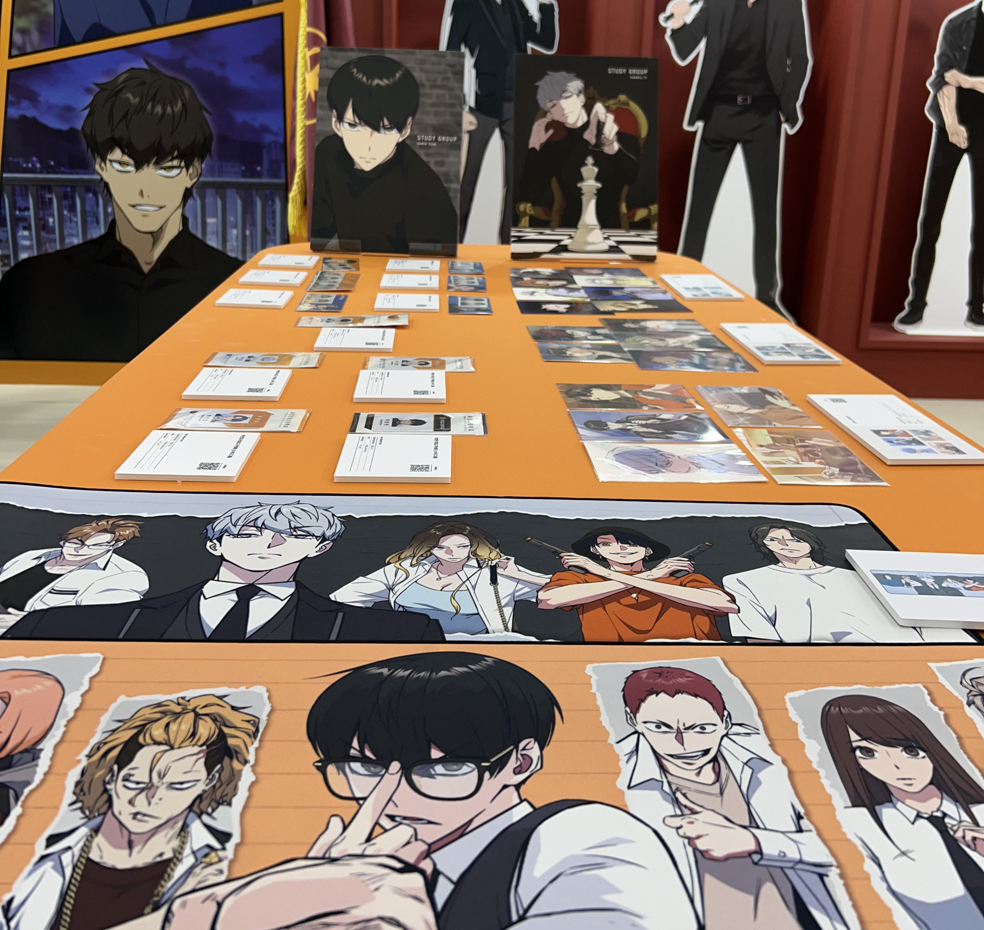 The orange YLAB arrow leads to a booth featuring the studio’s webtoons, including Study Group (written by Hyungwuk Shin and illustrated by Seungyeon Ryu).